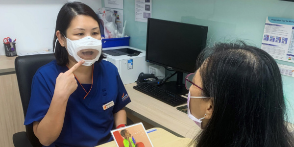 Seeing through the mask: medical-grade transparent face masks developed for speech therapists