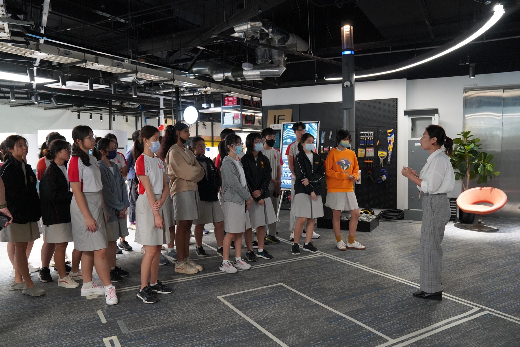 National Junior College students learning about Innovation Factory’s Material Lab from Product & UI/UX Designer, Audrey Ng.