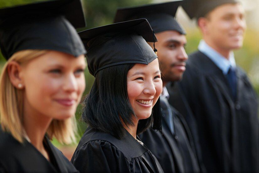 graduation-smile-woman-student-row-with-friends-university-college-ceremony-outdoor-education-scholarship-success-with-young-person-campus-achievement-celebration_590464-286632
