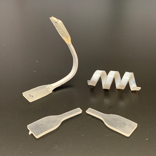 Dr Li's prototypes (top row) compared with existing PLA materials, which are brittle (bottom row)