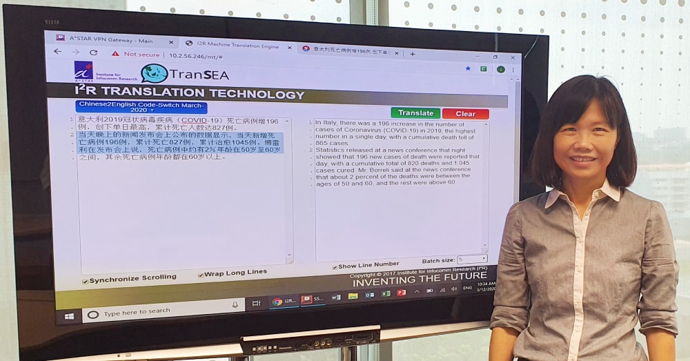 Women in Science: Ms Aw Ai Ti posing with the AI-translation technology behind SG Translate
