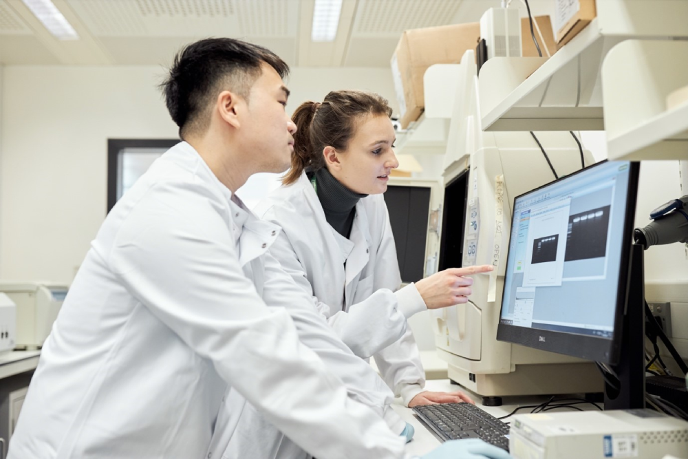 Peter with a colleague at the Wellcome Centre for Human Genetics in Oxford