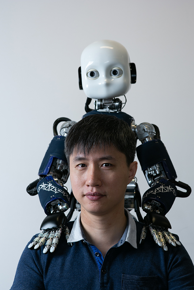 A*STAR Dr Wu Yan with his robot