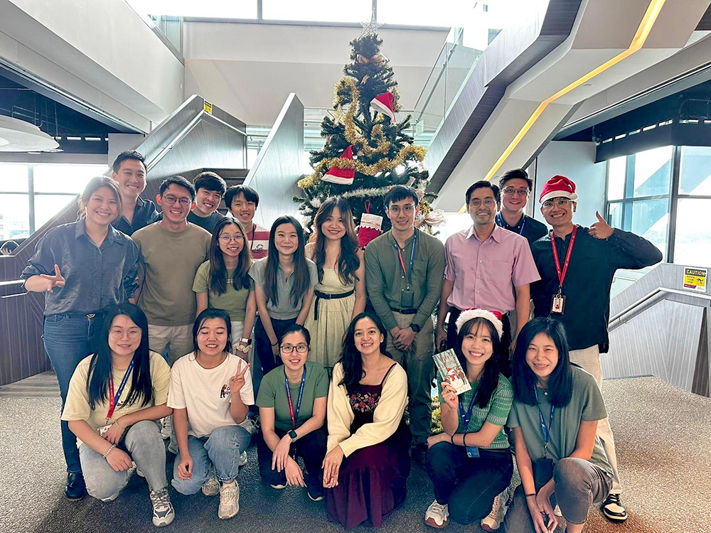 Prof Loh with his team of researchers