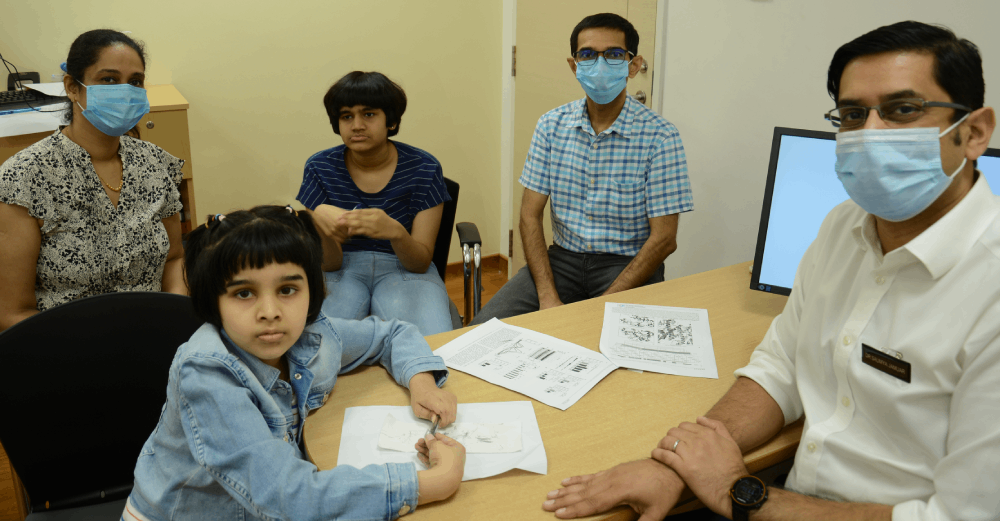 Dr Saumya Jamuar with patients and family