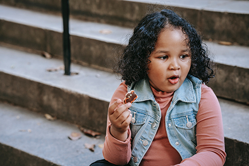 Girl eating cookie